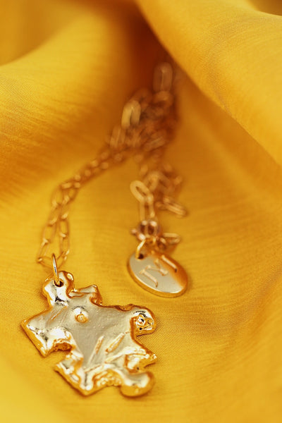 Puzzle necklace - gold